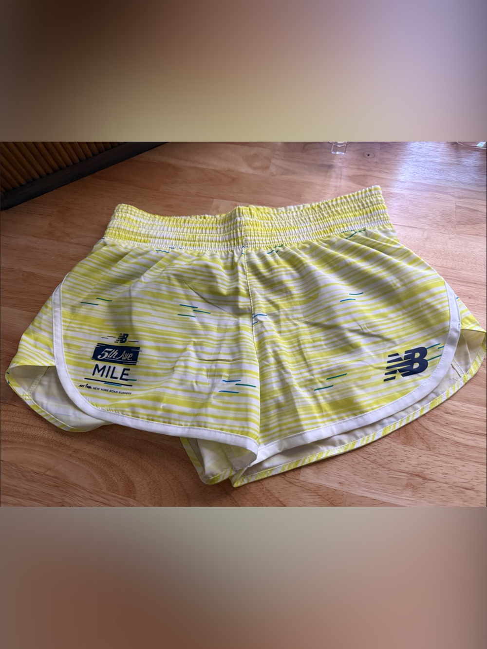 New Balance Yellow Striped Women’s Athletic Shorts with Blue Logo